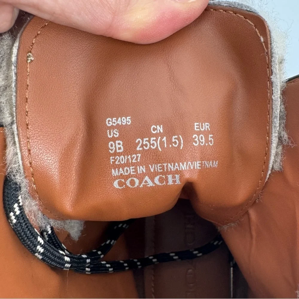 Coach Black fuzzy combat boots